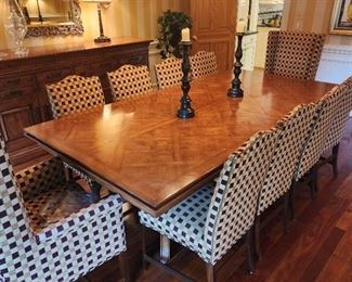 Table: 31"h x 96"w x 48"d, plus 2 leaves (24" each). side chairs (10) 40"h x 21"w x 20"d, armchairs (2): 46 x 26 x 24