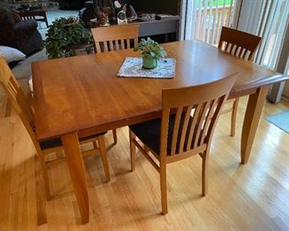 Arhaus Cherry Dining  Table w/ 6 chairs and 2 leaves   Measures: 60" X 42" w/o leaves, leaves measure 18" ea.