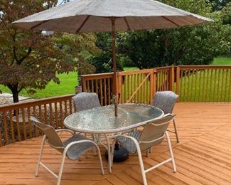 Patio Set w/ Umbrella                                                                    Please note: This item may be sold ahead of the Sale