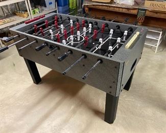 Foosball Table by Harvard                                                         Measures: 54" x 52"                                                                              Please note: This item may be sold before Sale