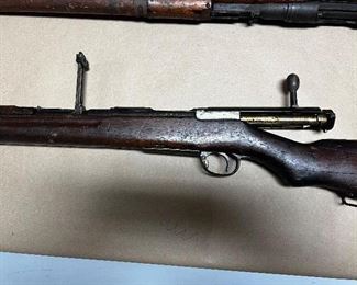 ARISAKA TYPE 38 SERVICE RIFLE. The Arisaka Type 38 Service Rifle is a K98 Mauser-inspired bolt action rifle designed in 1905 that was
used by the Empire of Japan predominantly during the Second Sino-Japanese War and Second World
War. It was partially replaced during WWII with the Arisaka Type 99 rifle.