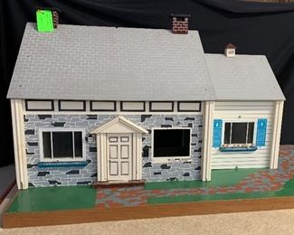 House for Sale! LOL!!!
1950s dolls house with base. 
Clean, but needs a few repairs. 
