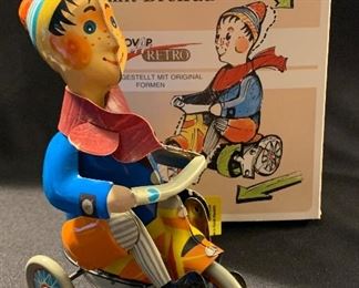 Czechoslovakian “Boy on Tricycle.”
One pedal missing. Works though. 
Original box. 