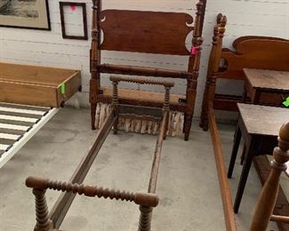 Antique rope bed and child’s/elder’s bed. 