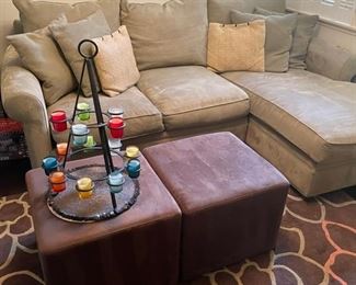 Sectional, cube tables, candle pyramid, rug