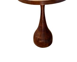 $325 - Darby Sculptural Wood End Table LD125-10           Description: Smooth, sculptural lines and a glossy walnut finish create a luxurious effect in the Darby wood table. Definitely modern in attitude, this piece also has an earthy elegance which translates into many contemporary approaches and styles
Condition: Excellent
Dimensions: 18 x 18 x 24
For more pictures, contact us www.GoodbyHello.com Local pick up Bethesda, MD.  Contact us for shipper suggestions.
