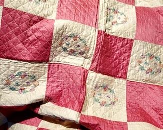Pink blocks and floral wreaths on this hand sewn quilt. Have you ever seen such ruler-straight stitches by hand? $195 or bid #89