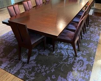 Exquisite custom made extension dining table and 10 upholstered chairs - table is 120"L x 54"W and extends an additional 15" to each end - the chairs are 37.5"H x 15.75"W and seats are 21"D