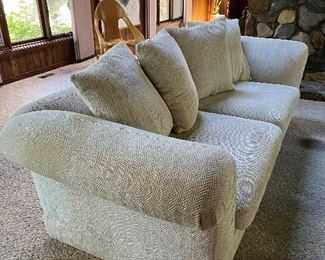 matching oversized roll arm off-white sofas; each measures 103"W x 45"D x 38"H - 2 cushion seats and 4 back pillows