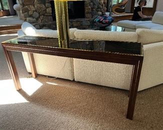 vintage Henredon console table with smoky mirrored glass top, brass inset, oak frame; 60"L x 16"D x 26.5"H lamps and other items shown in photo are not available