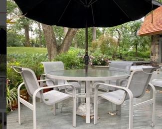 Halcyon outdoor patio furniture - aluminum framed table and sling chairs - total of 6 arm chairs, 1 round table, 2 ottomans, and 2 side tables - umbrella not available