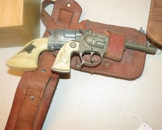 HUBLEY TOY GUNS WITH HOLSTER.