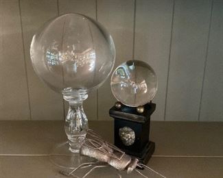 Glass orbs and a scarab. 