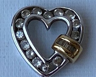 14 Karat Gold Ring With Diamond Chips & 14 Karat Heart Pendant
Lot #: 24