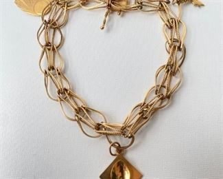 Vintage 14 Karat Gold Charm Bracelet With 3 Charms
Lot #: 11