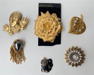 5 Vintage Gold Tone Brooches Including New Monet & Elephant Pendant Jewelry
Lot #: 80