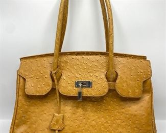 Ostrich Skin Leather Bag With Lock
Lot #: 26