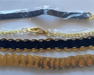 5 Scarves, 2 New Belts & Bag Of New Nylon Socks
Lot #: 83