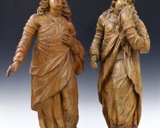 A pair of 18th century or earlier German carved Chestnut figures.  Depict a Renaissance style man and woman with painted finish.  Minor damage and older repairs.  Up to 30" high.  ESTIMATE $1,000-2,000
