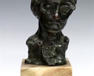 Lot 67: After Auguste Rodin, French, 1840 - 1917.  Bronze bust entitled "Etude de buste pour le Portrait de la Comtesse de Noailles".  Signed in the cast "A. Rodin" with the foundry mark "Alexis Rudier, Foundeur, Paris" verso.  Original dark mottled Green/Black patina with slight wear, presented on an Onyx plinth with minor edge roughness.  Sculpture 5 3/4" high, 7 1/2" high overall.  ESTIMATE $6,000-8,000
