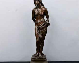 Lot 75: Juan Terville, French, late 19th/early 20th century.  A late 19th century Bronze figure of Andromeda.  Depicted semi nude lashed to a post as she awaits her fate of being devoured by a sea monster before being rescued by Perseus, on an octagonal molded plinth.  Incised "Terville Juan" signature at base.  Dark Brown patina with some wear.  39 1/2" high.  ESTIMATE $3,000-4,000