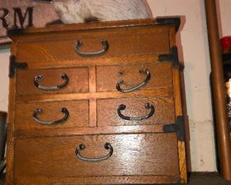 so many nose rings on this vintage dresser