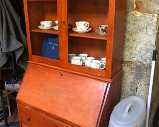 . . . and I fell down in the bathtub. I was't even taking a bath! I was just walking by, stumbled, and fell into the tub! Secretary desk w/ many missing teeth