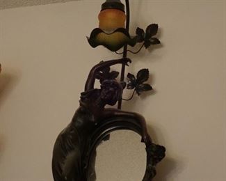 WOMAN WITH MIRROR AND LILY LAMP
