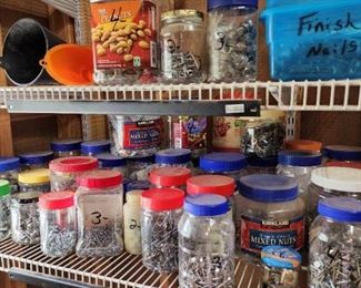 At least 30 jars full of nuts, bolts, screws, nails, anything frequently used, sorted so that easy to see.