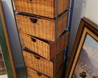 Wicker storage cabinet with casters