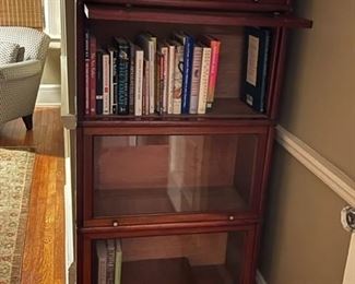 Barrister's mahogany bookcase with inlaid pearl-handled liftup doors.  $1,000