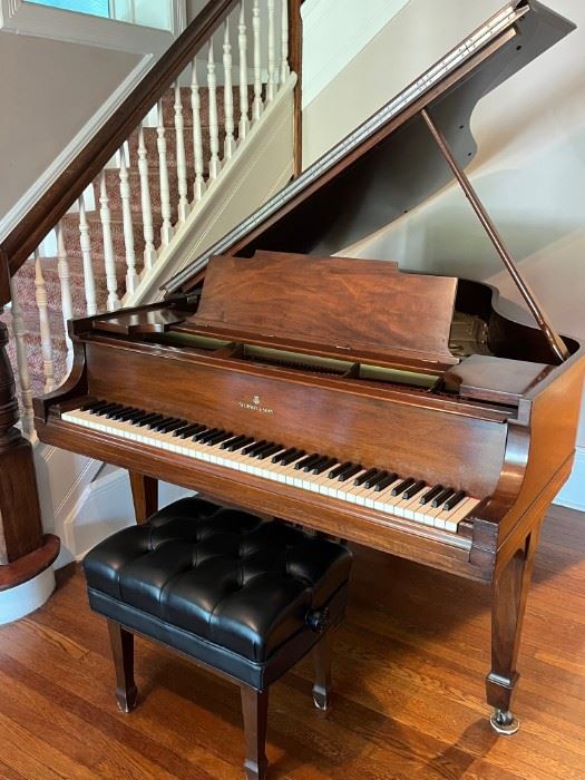 Steinway baby grand with piano bench.   $15,000