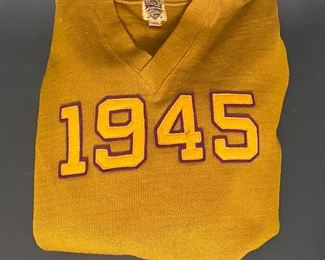 An original 1945 letterman sweater ........To register and to place bids simply go to www.capitolsalesservices.hibid.com