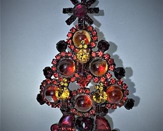 Larry Vrba Christmas tree brooch........To register and to place bids simply go to www.capitolsalesservices.hibid.com