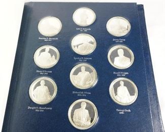 Presidential silver rounds-this is a book of 40 presidential rounds-in mint condition truly.