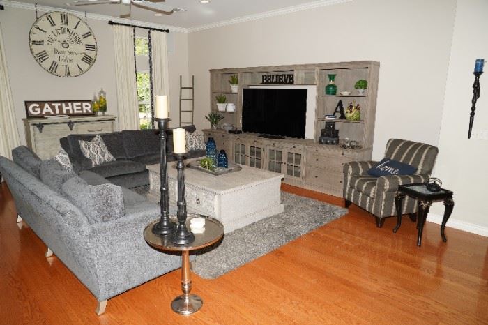 This living room is full of Pottery Barn Ultrasuede sofas, media cabinets, and buffets. Yeah!
