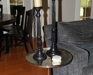 Brushed & hammered silver side table with 2 oversized black metal floor candle holders with candles