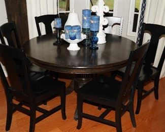 Pottery Barn pedestal table with 6 chairs and a leaf