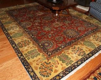 Hand knotted wool floor rug