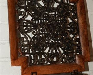 Heavy iron scroll & wood display piece on iron stand.  