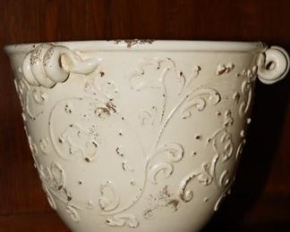 Distressed floral ceramic planter/vase.