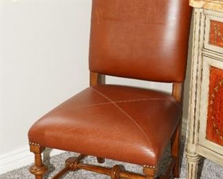 Sarreid leather wrapped chair.  There are 6 of these. 
