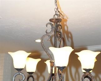 Iron multi-torchiere chandelier for sale.