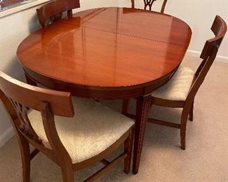 Mid century cherrywood dining table, 4 chairs . Plus leaf.   $300 