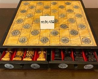 Mother-of-Pearl inlayed case and board with hidden drawers.  14" x 14" with 1.75" height. 