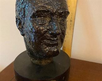 Sculptured FDR head on wooden base with bronze medallion of same.  