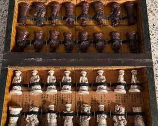 Mint condition Chinese travel set complete with box/board and brass lock.