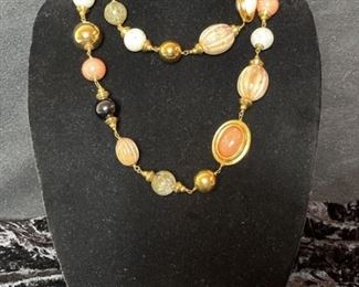 Necklace, Gold Earrings, and Elephant Pins