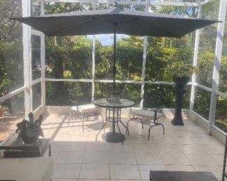 Patio table and chairs. Patio umbrella