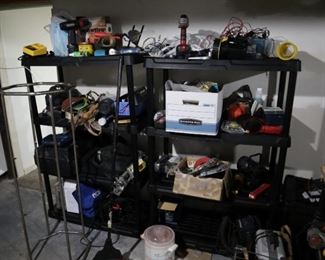 Hand tools, power tools, stacking storage shelves, flashlights, crockpot, cleaning supplies.